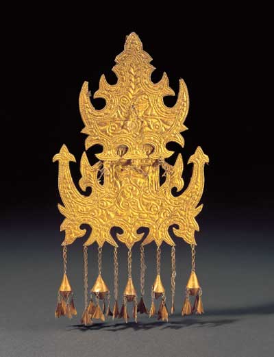 Peça de arte asiática em ouro